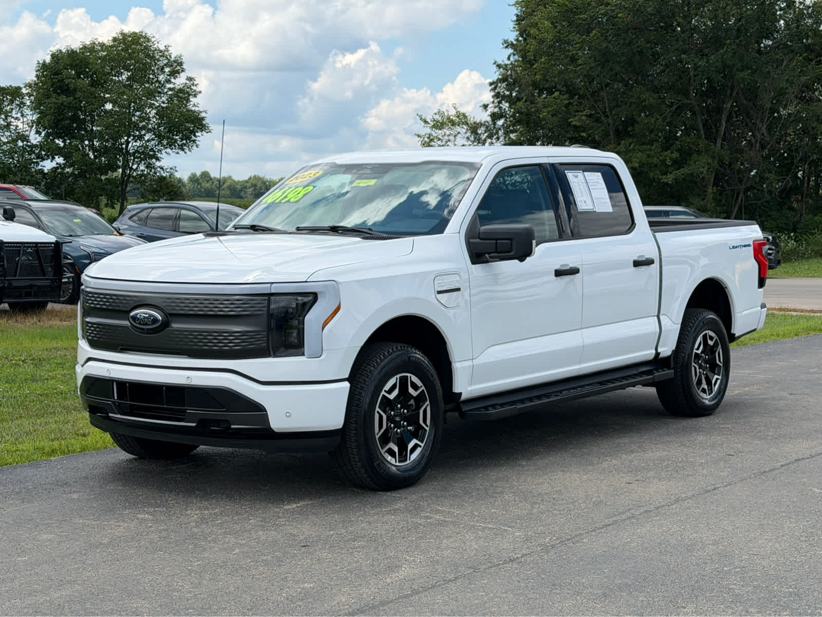 Used 2023 Ford F-150 Lightning XLT with VIN 1FT6W1EV1PWG56282 for sale in Mount Orab, OH
